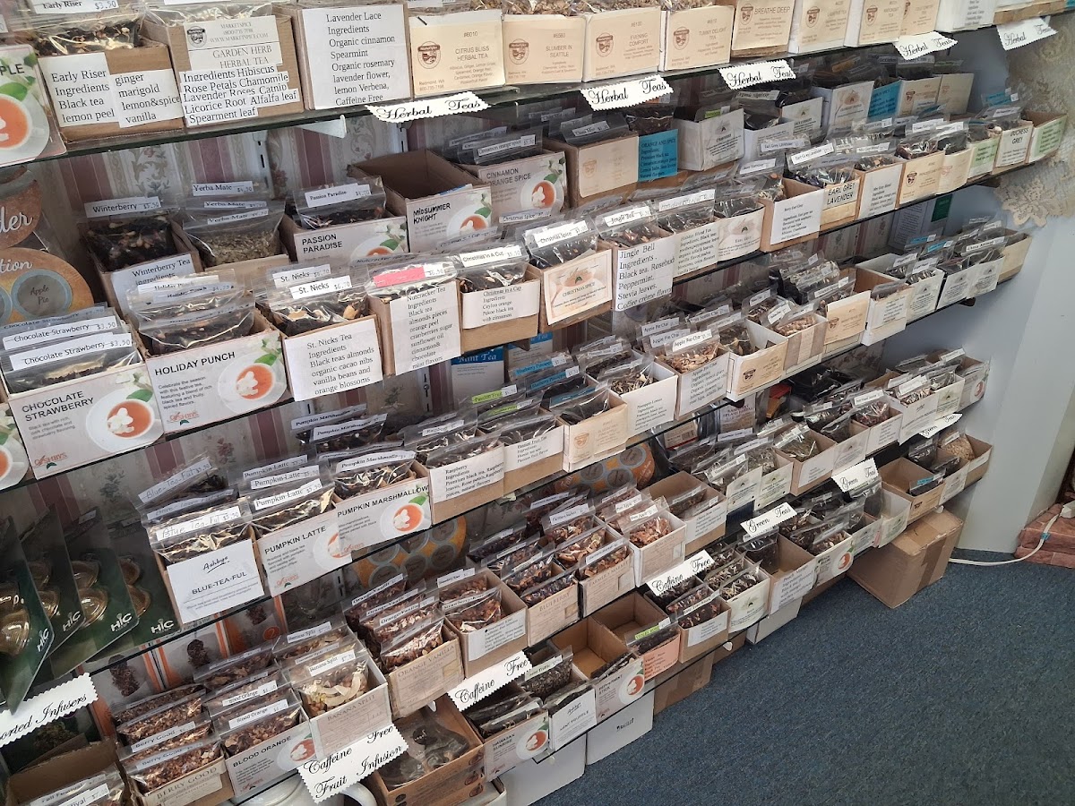 A wall of hand-labeled loose-leaf tea bins at Victorian Connection